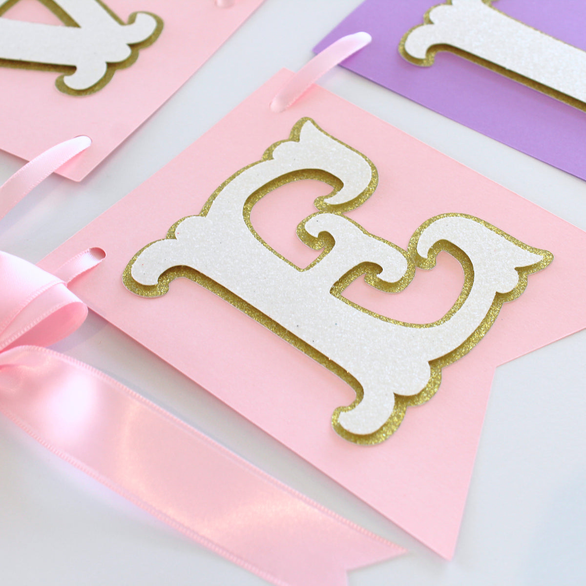 Pink and Purple Princess Happy Birthday Banner - Custom Name Banner with Bows and Gold Crowns