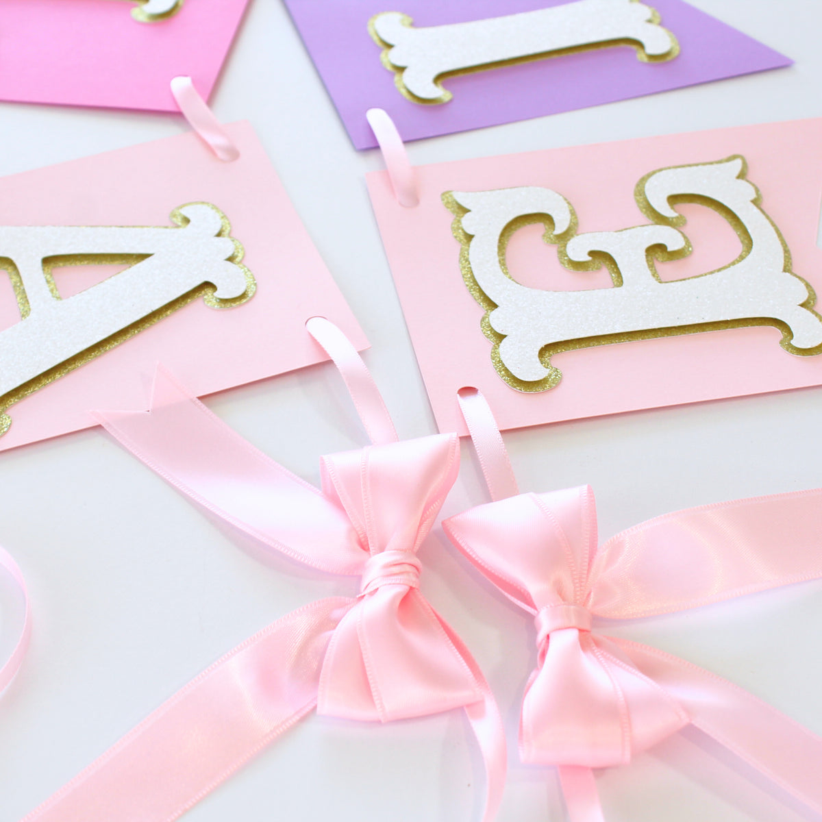 Pink and Purple Princess Happy Birthday Banner - Custom Name Banner with Bows and Gold Crowns