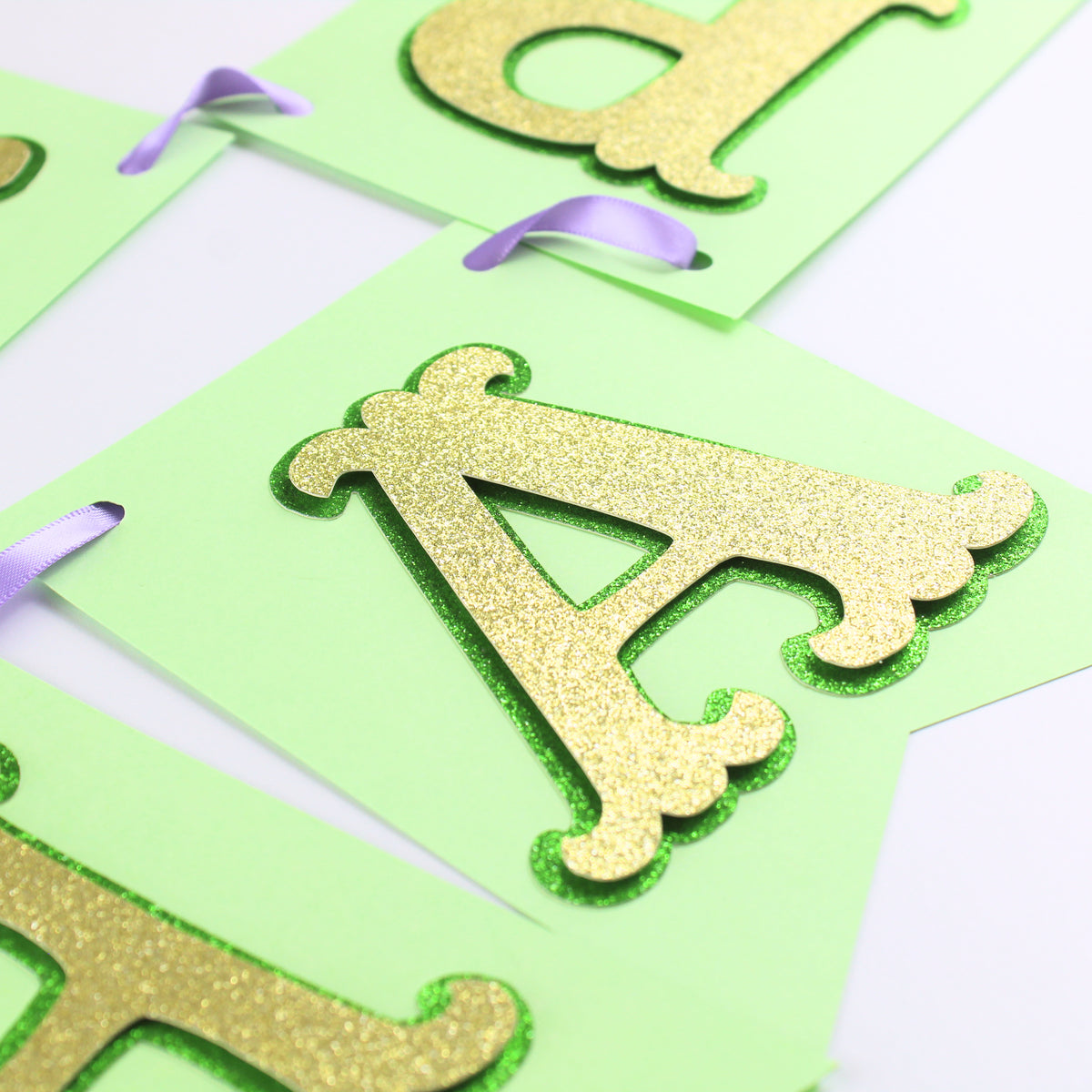Green and Purple Princess Happy Birthday Banner - Custom Name Banner with Bows and Gold Crowns